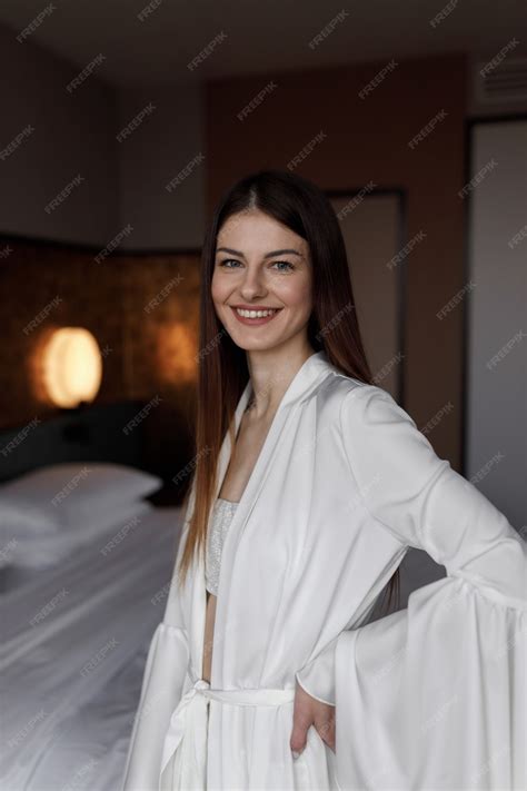 Premium Photo Beautiful Morning Of The Bride In A Light Boudoir Dress In A Hotel On The Bed A