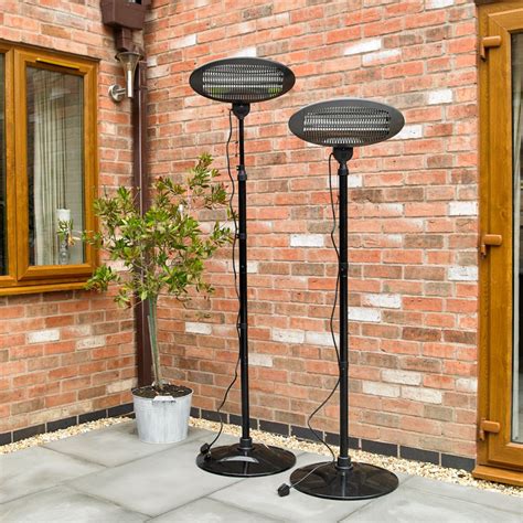 They both have their advantages. Electric 2KW Freestanding Quartz Outdoor Heater Garden ...