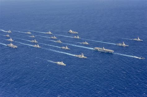 Navy Ships Sail In Formation With Japanese Australian And Canadian
