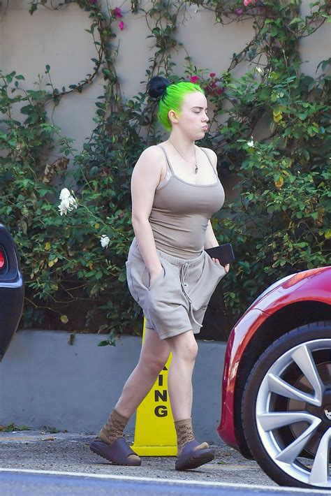 Billie Eilish 18 Wears 55 Yeezy Sandals And A Nude Tank Top In Rare