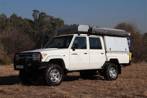 New car specs & test drives. Toyota Land Cruiser Double Cab Bushcamper for hire ...