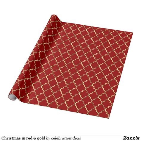 A Red And Gold Christmas Wrapping Paper With An Intricate Design On The