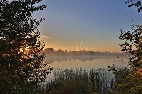 Early Morning Sunrise Over The Lake Stock Photo Image Of Outdoors