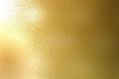 Light Shining On Rough Gold Metal Sheet Texture Abstract Background