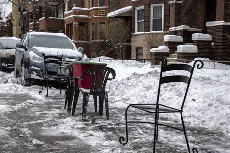 Dibs Saving Your Parking Spot In Chicago Patio Chairs An A Tupperware