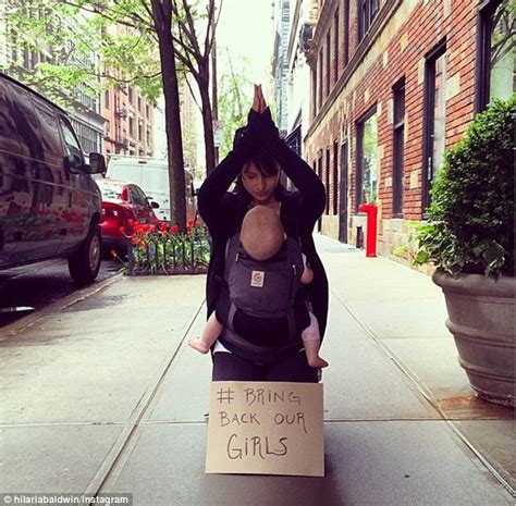 Hilaria Baldwin Stops Sidewalk Traffic By Getting Down On Her Knees