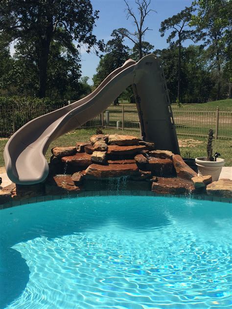 What pool slide types should you consider, and what's the best inground pool slide for your family? Inground swimming pool/Turbo Twister Slide/Rock Waterfall ...
