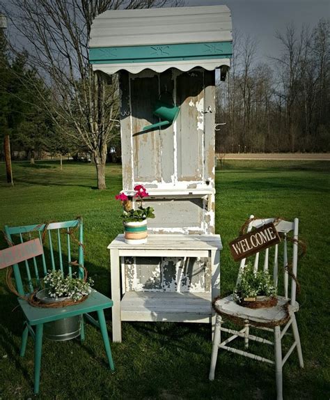 Add a cute saying to the top for an extra sweet touch. Welcome Chair planters and Old metal Awning Old Door potting table all locally m | Metal awning ...