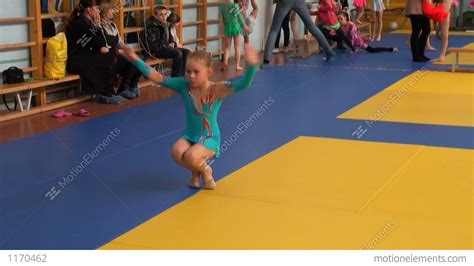 Rhythmic gymnastics is a sport that combines elements of ballet, gymnastics, dance, and apparatus manipulation. Rhythmic Gymnastics Training Stock video footage | 1170462