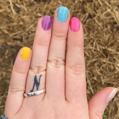 Tiny initial tattoo on the finger. 100+ Initial Tattoos Perfect For Proclaiming Your Love For ...