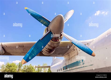 Old Russian Turboprop Aircraft At The Abandoned Aerodrome In Summertime