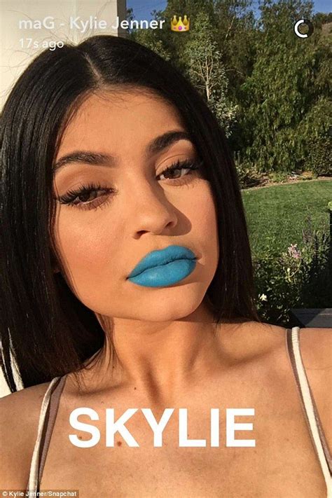 kylie jenner models her new lipstick shades in electric and navy blue kylie jenner eyebrows