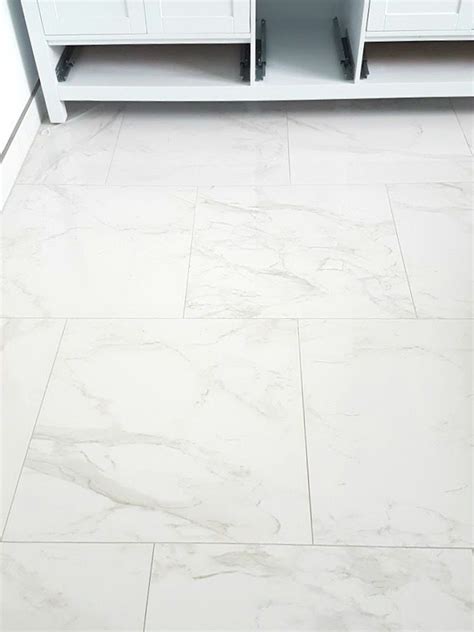Choosing Faux Carrara Marble Floor Tile For The Bathroom The