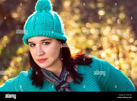 A Portrait Of A Stylish And Beautiful Woman In Matching Hat And Sweater