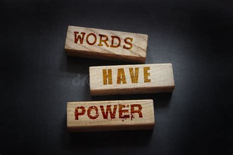 The Phrase Words Have Power On Wooden Blocks Laying On Black Background