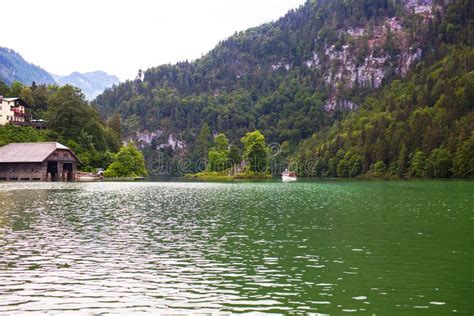 Boat Sailing On The Mountain Lake In The Alps On Konigssee Lake Stock