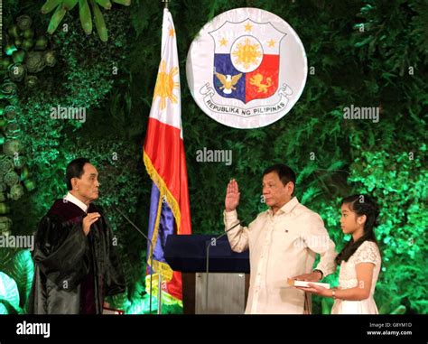manila philippines 30th june 2016 rodrigo duterte c takes his oath at the malacanang
