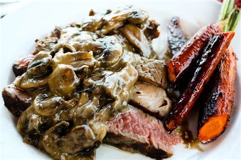 Serve steaks with mushroom sauce. Grilled Ribeye Steak with Mushroom Sauce | Girl Gone ...