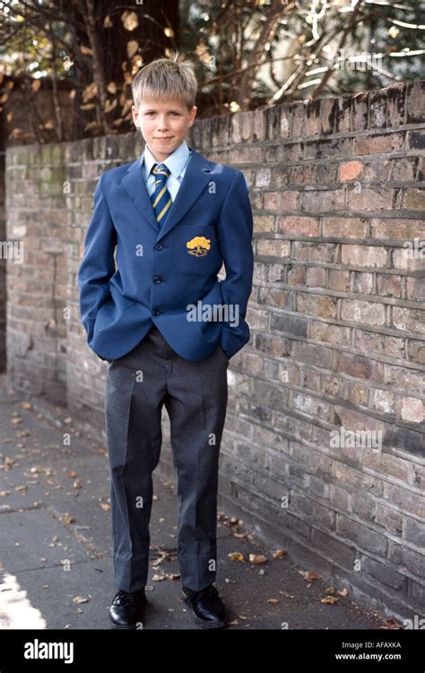 Boy In Uniform Going To His First Day At School Stock Photo Alamy