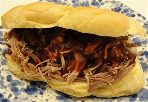 This slow cooker pulled pork is a versatile dish that can be used for a variety of meals. There's always thyme to cook...: Pulled Pork Sandwiches
