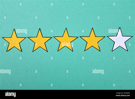 Four Golden Stars Of Five Stock Photo Alamy