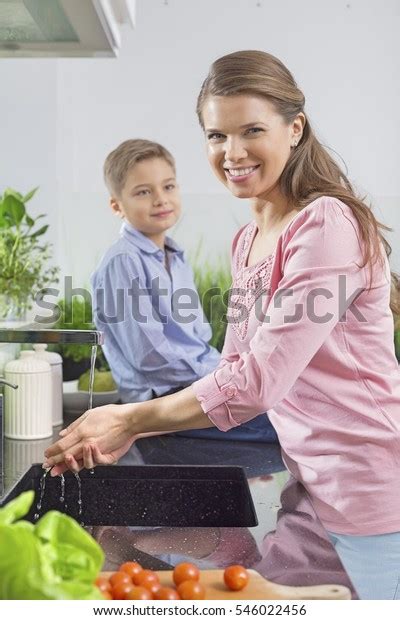Portrait Smiling Woman Washing Hands Son Stock Photo 546022456