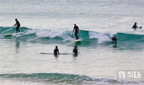 Surfers On Porthmeor Beach St Ives Cornwall England Europe Stock