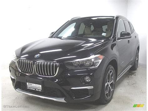 Its powerfully defined silhouette inspires with its long wheelbase. 2018 Black Sapphire Metallic BMW X1 xDrive28i #129592532 | GTCarLot.com - Car Color Galleries