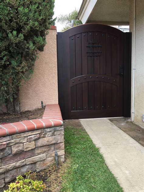 Custom Wood Gate By Garden Passages With Decorative Metal Grill And
