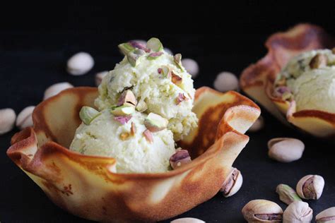This pistachio ice cream recipe produces extremely smooth and creamy ice cream with an intense roasted pistachio flavour. Homemade No Churn Pistachio Ice Cream - DomesticAdventurer