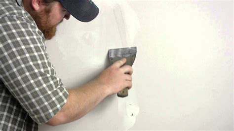 Good cardboard to use for fixing a hole in your wall will be thick, smooth, and hard to rip. Patching Torn Drywall Paper : Wall Repair - YouTube