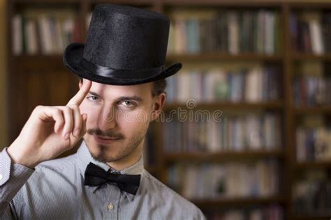 Attractive Young Man Wearing Top Hat And Bow Tie Stock Photo Image Of