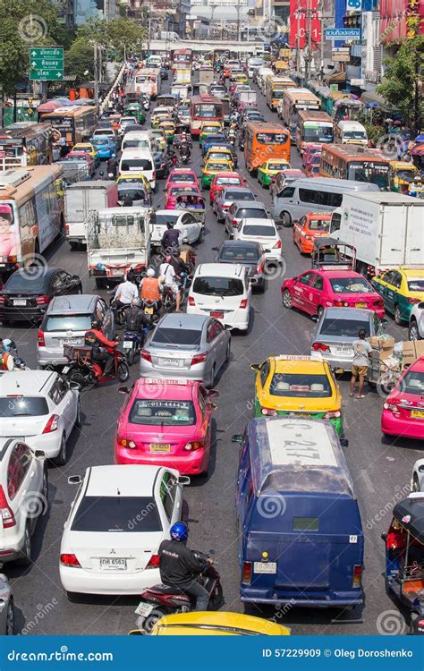 Traffic Moves Slowly Along a Busy Road in Bangkok, Thailand. Editorial