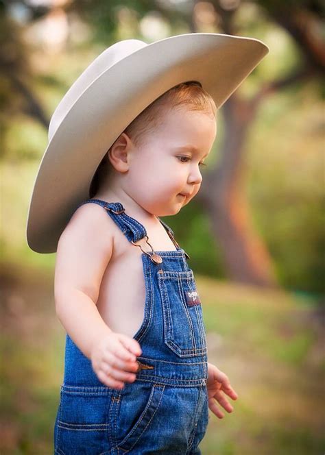 Baby With Cowboy Hat And Overalls Baby Cowboy