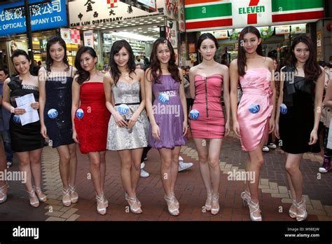 Contestants Of The Miss Asia Pageant Pose During An Event To Engage On Site Spectators For