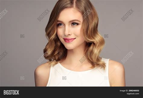 blonde woman curly image and photo free trial bigstock