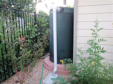 Poly Mart 250 Gallon Dark Green Rainwater Harvesting Tank Installed In