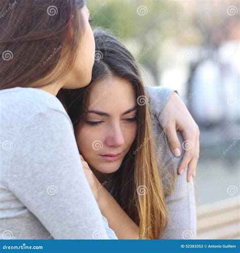 Sad Girl Crying And A Friend Comforting Her Royalty Free Stock