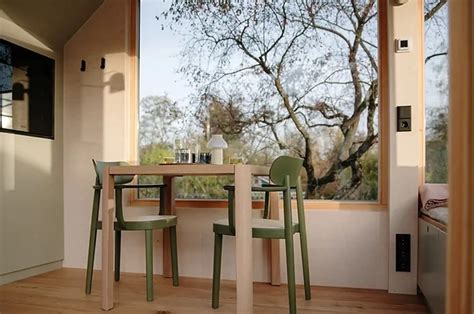 This two-story tiny home redefines modern micro-living setups - Design