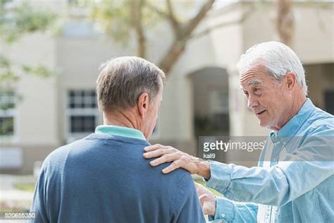Hand On Shoulder Stock Photos And Pictures Getty Images