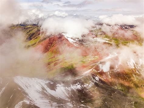 Aerial View Of Snowy Hazy Vinicunca Rainbow Mountain Peru Stock