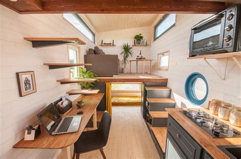 Photo 2 of 13 in This 140-Square-Foot Tiny House Is Packed ... Find photos of the big chair.