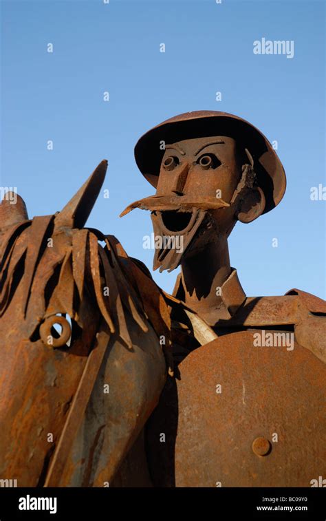 Rusty Iron Statue Of Don Quixote De La Mancha On His Horse Rocinante