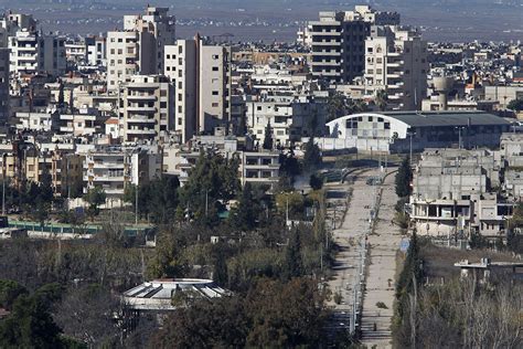 Syria Shattered City Of Homs Returns To Assad Control As Fighters