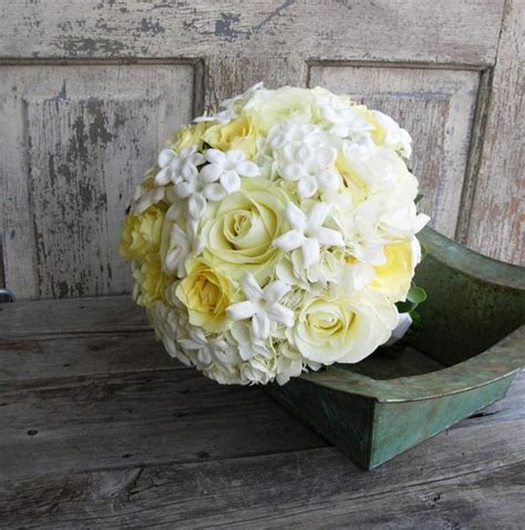 Dried, silk, foam or plastic flowers all offer a reliable alternative to fresh flowers. Bridal bouquet in white with yellow accents - Dominant ...