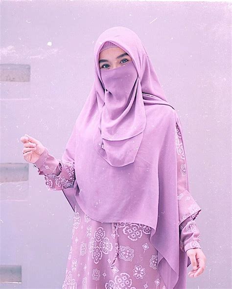 image may contain 1 person standing hijabi outfits hijabi girl modest outfits niqab fashion