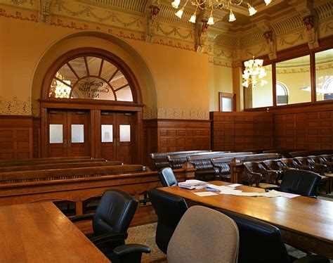 Download Wooden Tables In Courtroom Background | Wallpapers.com