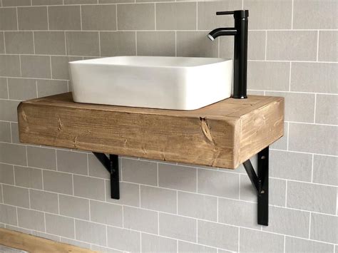 In the first case, the storage space is total because the washbasin which style for your vanity unit? The floating beam shelf wash stand sink unit hand crafted ...