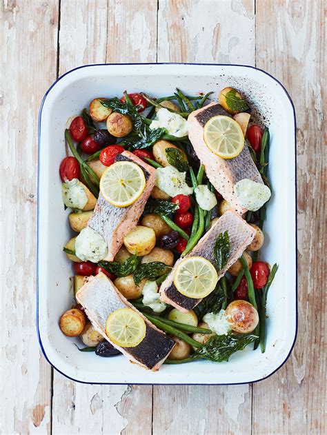 It is important to add the stock when it is hot. Roasted salmon & veg traybake | Fish recipes | Jamie ...