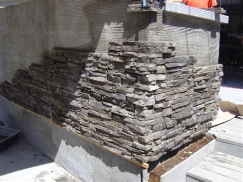 These outdoor kitchens created with natural stone and granite from swenson granite works will give you some design inspiration. stone veneer - fireplace, BBQ island, backyard wall ...